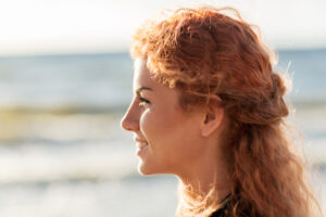 profile view of woman on beach